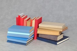 Stack of Books on gray background 