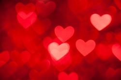 red hearts bokeh as background