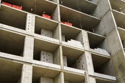 construction of a multi-storey residential building, concrete frame and building materials
