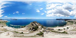 360 Degree panoramic sphere photo taken in the beautiful coastal area of Corfu one of the Greek Island in Greece, taken with a drone at the old Venetian Fortress with boats in the port town Corfu