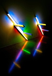 Abstract slanted tube lights in rainbow multi color red blue green yellow art abstract lighting
