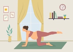 Pregnant women do yoga at home. International day of yoga.