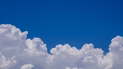 Beautiful Summer blue Sky Background with white cumulonimbus Clouds in sunny day