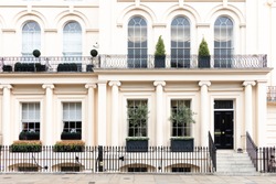 Luxurious old apartament house with a white facade, , Kensington, London, UK