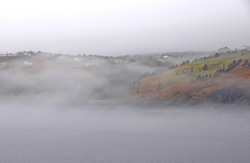 Killick Coast near Torbay,heavy fog over the ocean along the shoreline; Avalon Peninsula Newfoundland Canada 