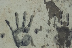 Art with hands in paint on wall concrete vintage