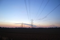 The silhouette view of high volt station and beautiful sunset.