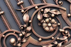 ornate wrought-iron elements of metal gate decoration