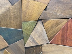 Abstract parquet floor with rumpled futuristic triangular geometric surface and wooden 3d background.