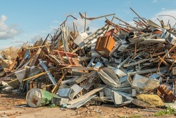 Processing industry, a pile of old scrap metal, ready for recycling. Scrap metal recycling.