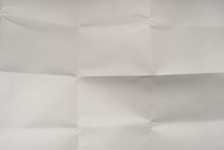 The texture of crumpled white paper. Background