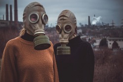 people wearing gas masks