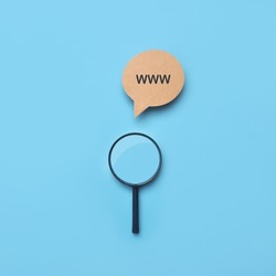Three W's and a magnifying glass. A symbol for searching for information on the Internet