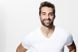 Smiley guy in white t-shirt, portrait