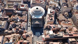 Aerial drone view of iconic Pantheon basilica built as a temple to all the gods of ancient Rome, and rebuilt by the emperor Hadrian about 126 AD, Rome, Italy
