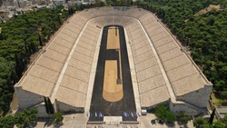 Aerial drone photo of iconic ancient Panathenaic stadium or Kalimarmaro birthplace of the original Olympic games, Athens historic centre, Attica, Greece