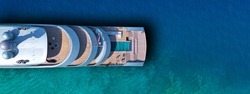 Aerial drone ultra wide photo of latest technology modern silver mega yacht and the only hybrid one called 