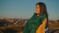 Happy girl with Brazil flag, independence day