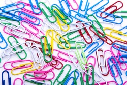 The office colorful paperclips on white background