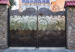 Decorative, forged barrier, fence in old stiletto