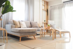 livingroom area white and light wood tone interior house japanese style 