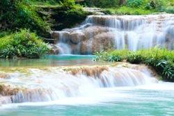 Thanawan Waterfall beautiful There is water throughout the year. The water is emerald green. Located in Doi Phu Nang National Park, Phayao, Thailand. Waterfall nature landscape