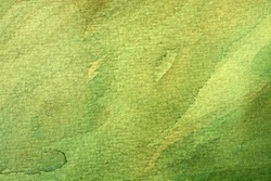 great green watercolor background - watercolor paints on a rough texture paper