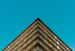 Modern Apartment Building against Clear Sky. Geometry in Architecture. Architectural Photography. Minimal Aesthetics.