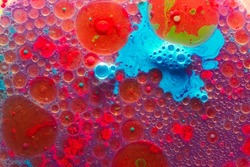 Close up macro shot of Abstract colorful Background Oil and color on water surface.