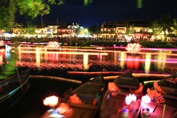 loi krathong festival Krathong to float in Loi kratong day,night light on river at Hoi An,Viet man