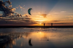 Sunset with kite reflections, Los Lances beach, Tarifa, Cadiz Province, Andalusia, Spain