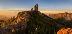 Panoramic view of Roque Nublo sacred mountain at sunset, Roque Nublo Rural Park, Gran Canary, Canary Islands, Spain