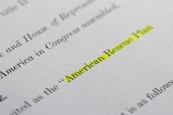 Closeup of the documents of the American Rescue Plan Act of 2021, an economic stimulus package proposed to speed up the recovery from the economic and health effects of the pandemic and the recession.