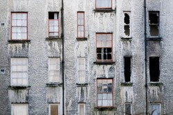 Derelict abandoned council house in poor housing crisis ghetto estate slum in Port Glasgow uk