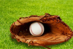 Baseball glove with a ball