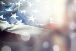 American flag for Memorial Day, 4th of July or Labour Day, blue bokeh background