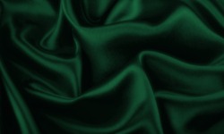 Deep, rich, emerald colored green satin fabric