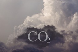 The sky is polluted with CO2. Clouds. Carbon capture technology