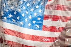 Investments in the United States. Economy and finance. Investments in American assets. American flag and stock charts. American dollars. Money, quotes, capital.