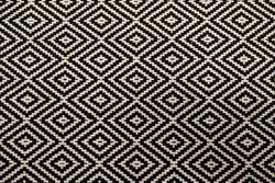 Front view of black and white ethnic pattern fabric for background or banner