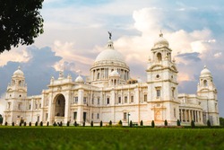 Victoria Memorial Kolkata at sunset with vibrant moody sky in the background. Victoria Memorial is a monument and museum built in the memory of Queen Victoria in 1921 at Kolkata in India