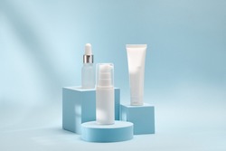Three cosmetic product mockups on geometric podiums. Background for presentation of cosmetic