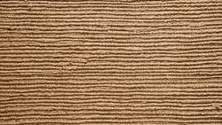 Texture of the woven jute carpet. Natural organic fiber