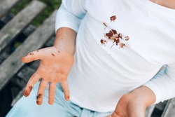 Chocolate stains on children's clothes. daily life dirty stain for wash and clean concept. top view. High quality photo