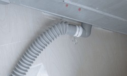 Gray washing machine drain hose