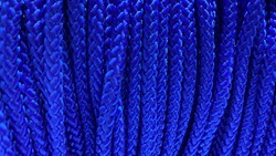 Roll of blue weave rope background. Abstract wallpaper.