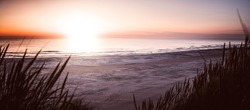 Beach panorama at sunset at the Baltic Sea in Denmark