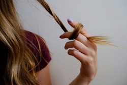 Girl twisting and twirling her hair