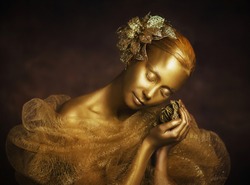 golden girl with gold flower golden girl statue