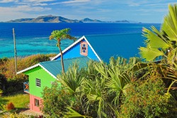 Colorful typical houses on shore of Union island, Caribbean Sea